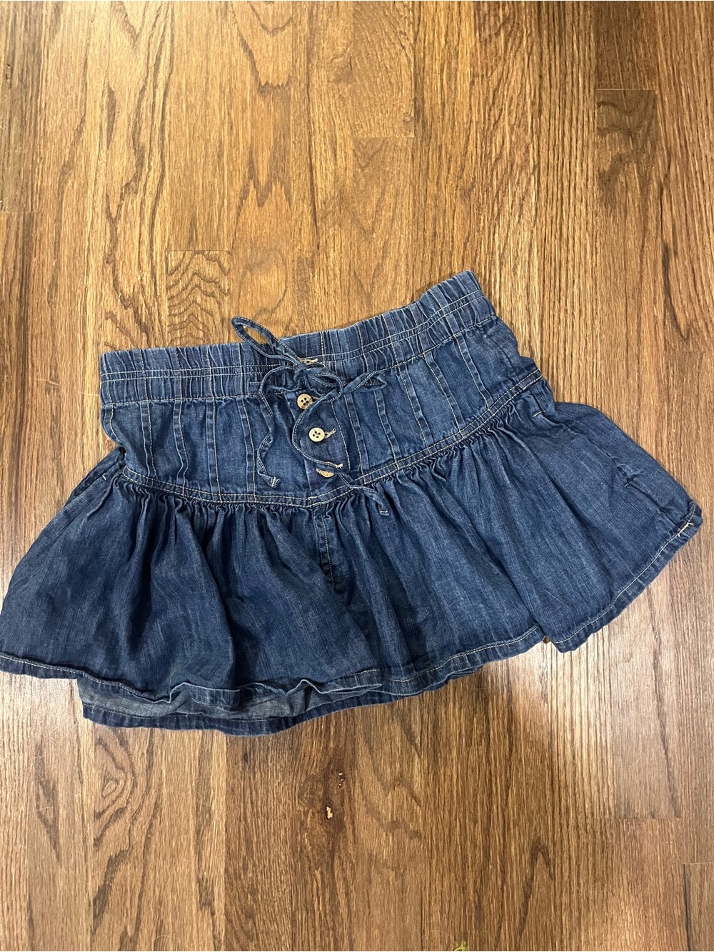 Denim Ruffle Mini Skirt with Button Detail free people